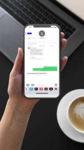 person holding a phone with text messages on it