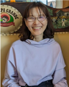 photo of the author, smiling into the camera