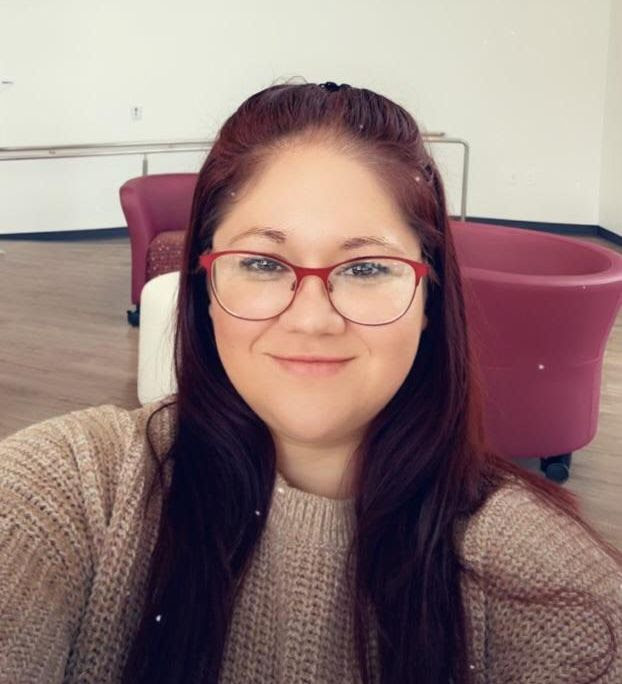 a photograph of Linda Landeros, facing the camera and smiling